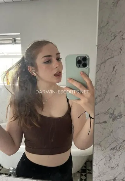 Darwin escorts Belinda — 2