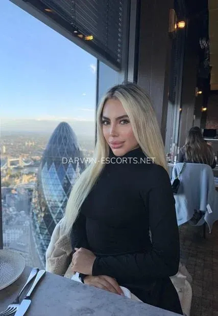 Darwin escorts Daniela — 1