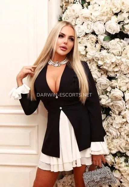 Darwin escorts Melanie — 2