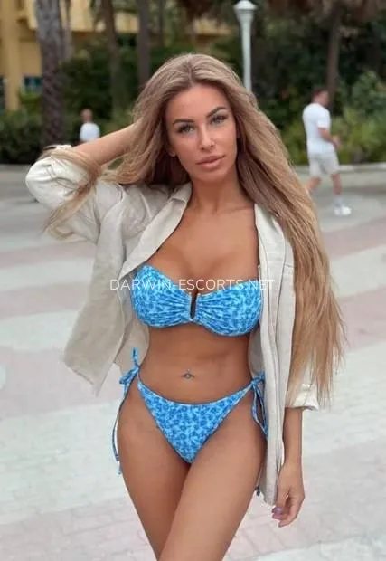 Darwin escorts Melanie — 2