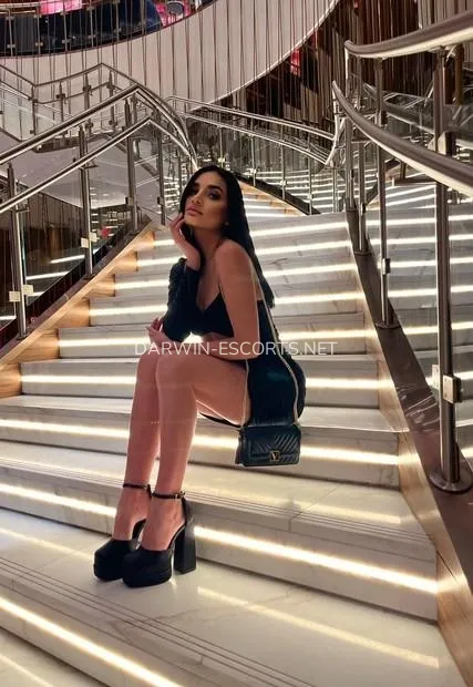 Darwin escorts Ingrid
