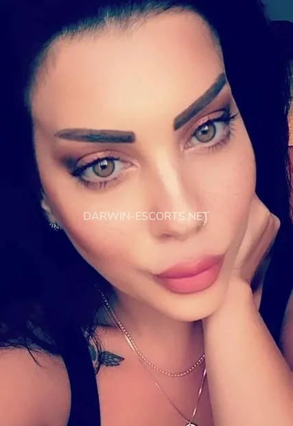 Darwin escorts Jacqueline — 2