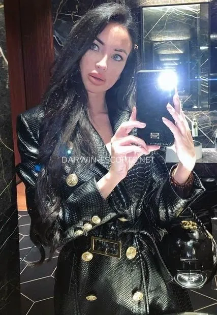 Darwin escorts Natacha — 2