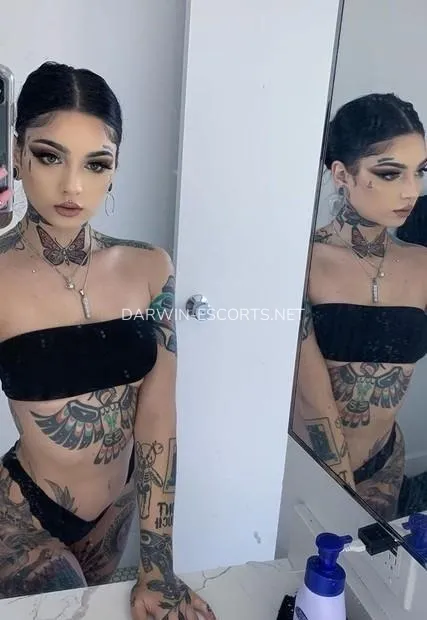 Darwin escorts Elvira